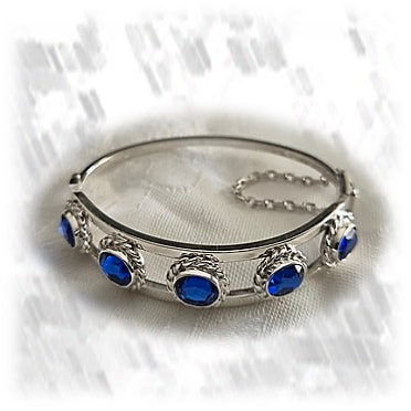 BA00650E-Sterling Silver Synthetic Sapphire Bangle. $650.00 now $455.00