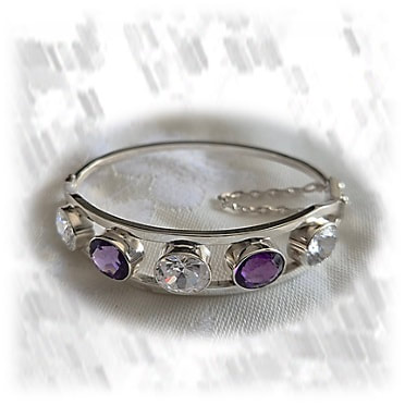 BA00700G-Sterling Silver Cubic Synthetic Amethyst Bangle. $700.00 now $490.00