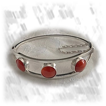 BA01200A-Sterling Silver Natural Coral Bangle. $1200.00 now $840.00