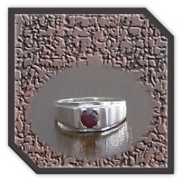 Main page item carved fluorite elephant $800D links to item men's silver & garnet ring $200A