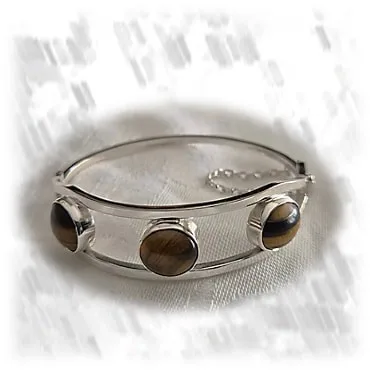 BA00600G-Sterling Silver Natural Tiger Eye Bangle. $600.00