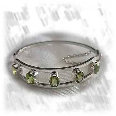 BA00650F-Sterling Silver Natural Peridot Bangle. $650.00