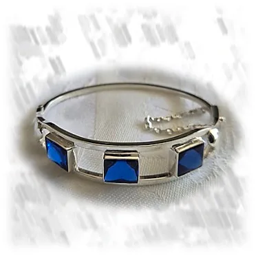 BA00700C-Sterling Silver Synthetic Sapphire Bangle. $700.00