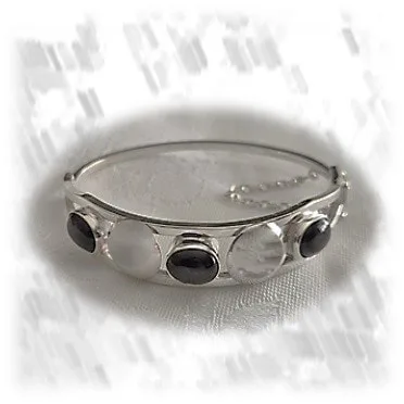 BA00700F-Sterling Silver Natural Australian Sapphire Bangle. $700.00