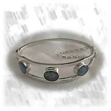 BA00900A-Sterling Silver Opal Bangle. $900.00