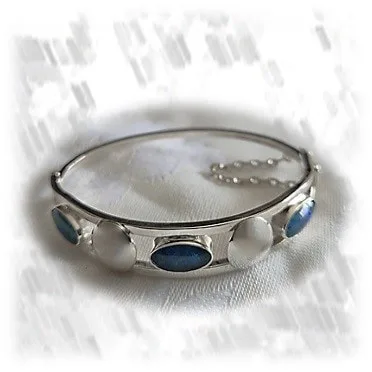 BA01000A-Sterling Silver Opal Bangle. $1000.00