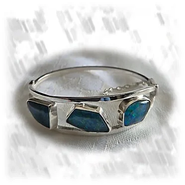 BA01200B-Sterling Silver Opal Bangle. $1200.00
