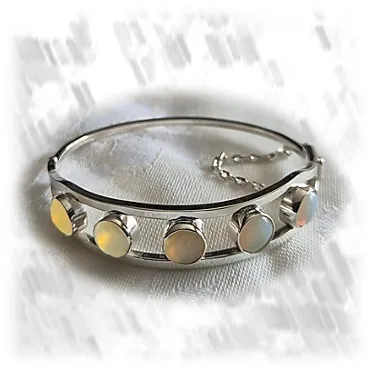 BA01800A-Sterling Silver Opal Bangle. $1800.00