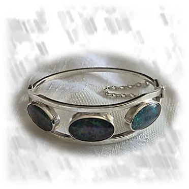 BA01800B-Sterling Silver Opal Bangle. $1800.00