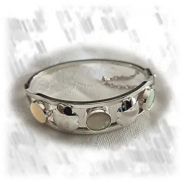 BA03000A-Sterling Silver Opal Bangle. $3000.00