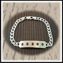 Main page item image Silver & Garnet Bracelet $600C