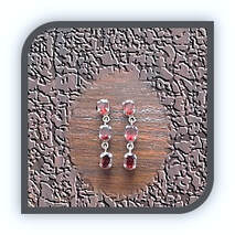 Main page item rhodium-plated silver & 2 x 3 oval garnet swing earrings $300A