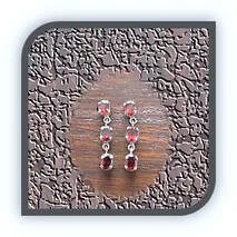 Main page item rhodium-plated silver & 2 x 3 oval garnet swing earrings $300A