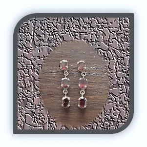 ER00300A-Sterling Silver Rhodium Plated Garnet Earrings. $300.00