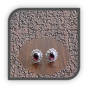 ES00150B-Sterling Silver Garnet Studs. $150.00