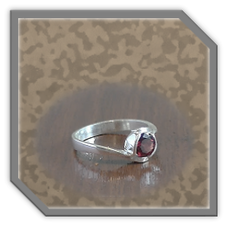 Main page item silver & garnet ladies ring $200F
