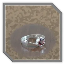 Main page item silver & garnet ladies ring $200F