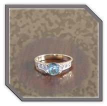 Main page item 9ct yellow gold blue zircon & cubic ladies ring $700A