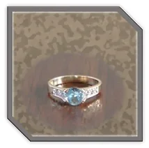 Main page item 9ct yellow gold blue zircon & cubic ladies ring $700A