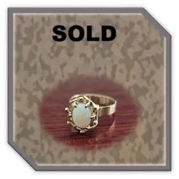 LR00700C-9ct Yellow Gold Opal Ladies Ring. $700.00