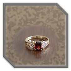Main page item 14ct yellow gold oval garnet & cubic ladies ring $1400B