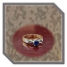 Main page item 18ct yellow gold & round sapphire ladies ring $1500D