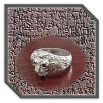 Main page item men's silver lion's head with ruby eyes ring $350F 