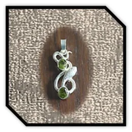PE00200B-Sterling Silver Peridot Snake Pendant. $200.00