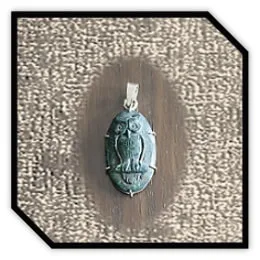 PE00400I-Sterling Silver Carved Matrix Opal Pendant. $400.00