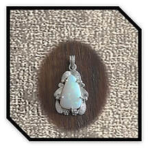 Main page item fancy edged silver & triangular solid opal pendant $400O
