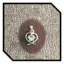 Main page item 18ct yellow gold heart shaped pendant with heart shaped aquamarine $750A