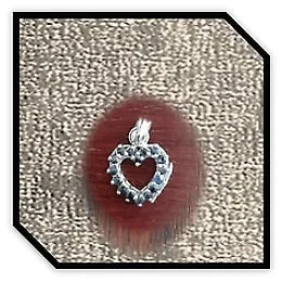 PE00750C-9ct White Gold Sapphire Heart Pendant. $750.00