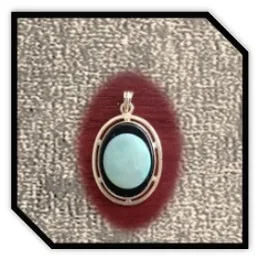 PE00900B-9ct yellow Gold Opal on Onyx Pendant. $900.00