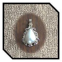 Main page item 9ct yellow gold rubies & pear-shaped blister pearl pendant $1100A
