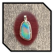 Main page item 9ct yellow gold & free-form opal doublet pendant $2500C
