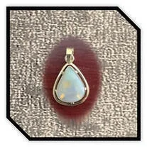 Main page item 18ct yellow gold & pear-shaped solid semi-black opal pendant $3200A